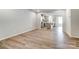 Spacious living area with hardwood floors leading into an open concept kitchen and dining area at 2330 Hedgecliff Rd # 157, Kannapolis, NC 28025