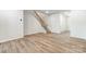Open concept living area featuring stylish floors and staircase leading to upper level at 2330 Hedgecliff Rd # 157, Kannapolis, NC 28025