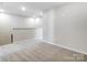 An open loft space featuring neutral carpet at 2330 Hedgecliff Rd # 157, Kannapolis, NC 28025