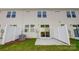 This backyard features grass, a privacy fence, and a patio at 2340 Hedgecliff Rd # 156, Kannapolis, NC 28025