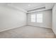 Bedroom with tray ceiling, neutral carpet and natural light at 2340 Hedgecliff Rd # 156, Kannapolis, NC 28025