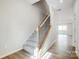 Hallway with hardwood floors and a staircase leading to the upper level at 2340 Hedgecliff Rd # 156, Kannapolis, NC 28025