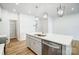 This bright kitchen has an island with quartz countertop, stainless steel appliances, and a walk-in pantry at 2340 Hedgecliff Rd # 156, Kannapolis, NC 28025