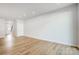 Spacious living room featuring hardwood floors, neutral paint, and ample natural light at 2340 Hedgecliff Rd # 156, Kannapolis, NC 28025