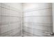 Spacious walk-in pantry featuring wire shelving for ample storage and organization at 2340 Hedgecliff Rd # 156, Kannapolis, NC 28025