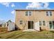 Backyard features a concrete patio, fenced yard, and vinyl siding exterior at 2350 Hedgecliff Rd, Kannapolis, NC 28025