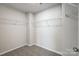 Walk-in closet features carpeted floors and wire shelving for optimal storage at 2350 Hedgecliff Rd, Kannapolis, NC 28025
