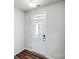 Bright entryway featuring a white door with glass inserts, seamlessly blending style with functionality at 2350 Hedgecliff Rd, Kannapolis, NC 28025