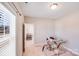 Bedroom featuring carpet floors, neutral walls, and a glass desk near the window at 245 Pine Eagle Dr, Rock Hill, SC 29732