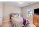 Comfortable bedroom with carpeted floors and a window, enhanced by natural light at 245 Pine Eagle Dr, Rock Hill, SC 29732