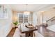 Elegant dining room featuring hardwood floors, a modern chandelier, and stylish decor at 245 Pine Eagle Dr, Rock Hill, SC 29732