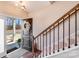 Welcoming foyer with hardwood floors, a staircase with iron balusters, and a view of the front door at 245 Pine Eagle Dr, Rock Hill, SC 29732