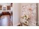 Hallway featuring a mirrored table with flowers and view into a kitchen at 245 Pine Eagle Dr, Rock Hill, SC 29732