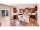 Modern kitchen with granite countertops, stainless steel appliances, and hardwood floors and sliding glass door at 245 Pine Eagle Dr, Rock Hill, SC 29732