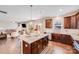 Stylish kitchen features granite countertops, stainless steel appliances, and opens to the living room at 245 Pine Eagle Dr, Rock Hill, SC 29732