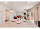 Close up of kitchen island with granite countertops, pendant lighting, and view of the living room at 245 Pine Eagle Dr, Rock Hill, SC 29732