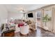 Bright living room with modern furnishings, hardwood flooring, and large windows at 245 Pine Eagle Dr, Rock Hill, SC 29732