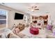 Living room with large television, ceiling fan and view of the kitchen at 245 Pine Eagle Dr, Rock Hill, SC 29732