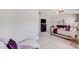 Spacious main bedroom featuring carpet, a vaulted ceiling, and an adjoining sitting room and bathroom at 245 Pine Eagle Dr, Rock Hill, SC 29732