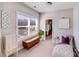 Bright sitting area featuring soft carpet, a window, and a comfortable chaise lounge at 245 Pine Eagle Dr, Rock Hill, SC 29732