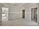 Spacious living room with smooth walls and doorways to additional rooms being built in this home at 265 Duke Dr, Salisbury, NC 28146