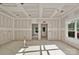 Beautiful living room being renovated with large windows bringing natural light to this new home at 265 Duke Dr, Salisbury, NC 28146