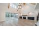Living area with hardwood floors, fireplace, built-in cabinetry, and access to screened porch at 310 Sugar Maple Ln, Weddington, NC 28104