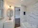Updated bathroom features modern fixtures, new tiles, and vanity sink at 337 Glenwood Dr, Mooresville, NC 28115