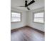 Bedroom with hardwood floors, baseboard heat and two windows at 337 Glenwood Dr, Mooresville, NC 28115