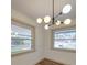 Dining room featuring updated windows and modern lighting fixture at 337 Glenwood Dr, Mooresville, NC 28115