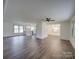 Spacious open-concept living area with views of the kitchen and dining room at 337 Glenwood Dr, Mooresville, NC 28115