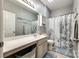 Bathroom with white vanity, storage cabinet and sea-themed shower curtain at 341 Fischer Rd, Fort Mill, SC 29715