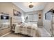 Cozy bedroom with neutral walls and carpet features a ceiling fan at 341 Fischer Rd, Fort Mill, SC 29715