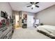Bedroom with modern decor, a fan, and access to a hallway at 341 Fischer Rd, Fort Mill, SC 29715