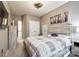 Bedroom with neutral walls and carpet features a ceiling fan and double closet at 341 Fischer Rd, Fort Mill, SC 29715