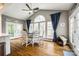 Breakfast nook with vaulted ceilings and large windows, hardwood flooring and French doors at 341 Fischer Rd, Fort Mill, SC 29715