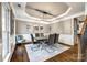 Elegant dining room with tray ceilings and stylish furniture at 341 Fischer Rd, Fort Mill, SC 29715