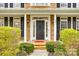 Elegant front entrance with stone columns and manicured shrubbery at 341 Fischer Rd, Fort Mill, SC 29715