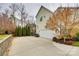 Well-maintained home exterior featuring a two-car garage and a long driveway at 341 Fischer Rd, Fort Mill, SC 29715