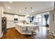 Modern kitchen with an island, stainless steel appliances, and a sun-filled breakfast nook at 341 Fischer Rd, Fort Mill, SC 29715