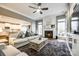 Open-concept living room with fireplace and view into the chef's kitchen at 341 Fischer Rd, Fort Mill, SC 29715