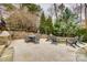 Spacious stone patio with dining and seating areas, ideal for outdoor gatherings and relaxation at 341 Fischer Rd, Fort Mill, SC 29715