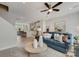 Open concept living room adjacent to a kitchen and dining area with comfortable seating at 348 Catawba Ave, Davidson, NC 28036