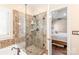 This bathroom includes a glass enclosed shower with tile surround and bronze fixtures at 5101 Belicourt Dr, Charlotte, NC 28277