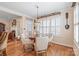 Charming breakfast nook with a round table, comfortable seating, and natural light from shuttered windows at 5101 Belicourt Dr, Charlotte, NC 28277