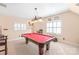 Spacious game room featuring a pool table, recessed lighting, and shuttered windows at 5101 Belicourt Dr, Charlotte, NC 28277