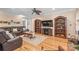 Spacious living room showcases hardwood floors, comfortable seating, and custom built-ins at 5101 Belicourt Dr, Charlotte, NC 28277