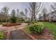 Well-maintained neighborhood park featuring landscaping, benches, and walking paths at 599 Sixth Baxter Xing, Fort Mill, SC 29708