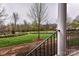 Scenic view from the porch showing a beautiful, well-maintained community green space at 599 Sixth Baxter Xing, Fort Mill, SC 29708