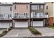 Townhome with an attached garage and a private deck in a residential neighborhood at 599 Sixth Baxter Xing, Fort Mill, SC 29708
